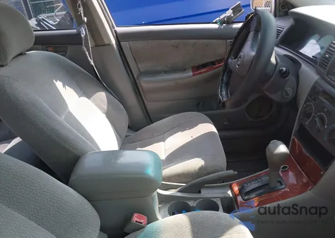 2004 Toyota Corolla Le z USA, uszkodzony, nr VIN 2T1BR32E64C254641